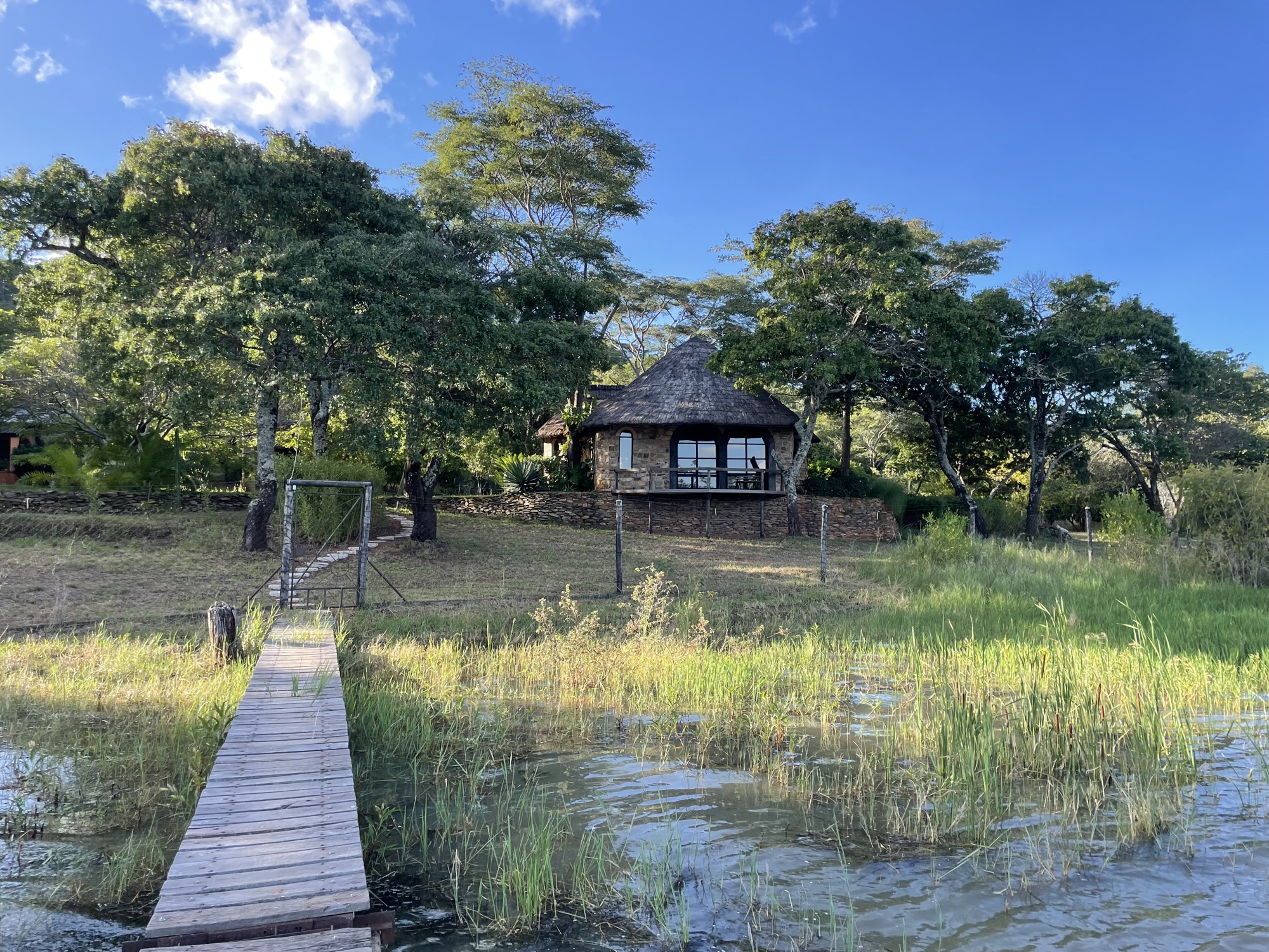 Wooden walkway entrance to MidWaters across the water
